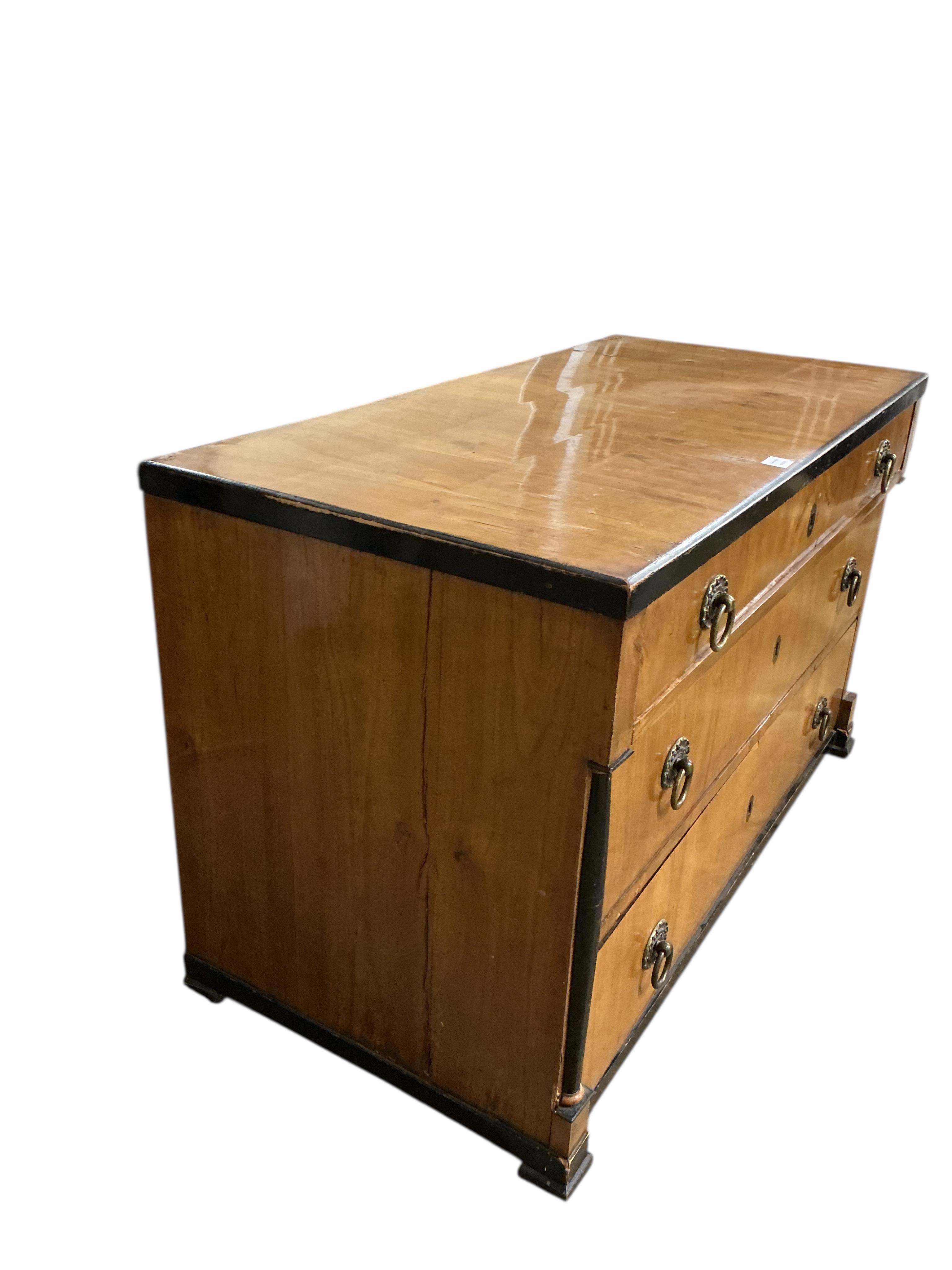 A 19th century Biedermeier style birch and ebonised commode, width 128cm, depth 62cm, height 78cm